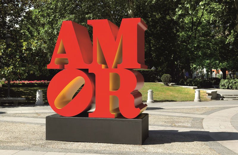 AMOR (1998-2006), polychrome aluminum, 96 x 96 x 48 in. (244 x 244 x 122 cm.), installation Paseo de Recoletos, Madrid, Spain, 2006 COLLECTION OF THE NATIONAL GALLERY OF ART, WASHINGTON, D.C.