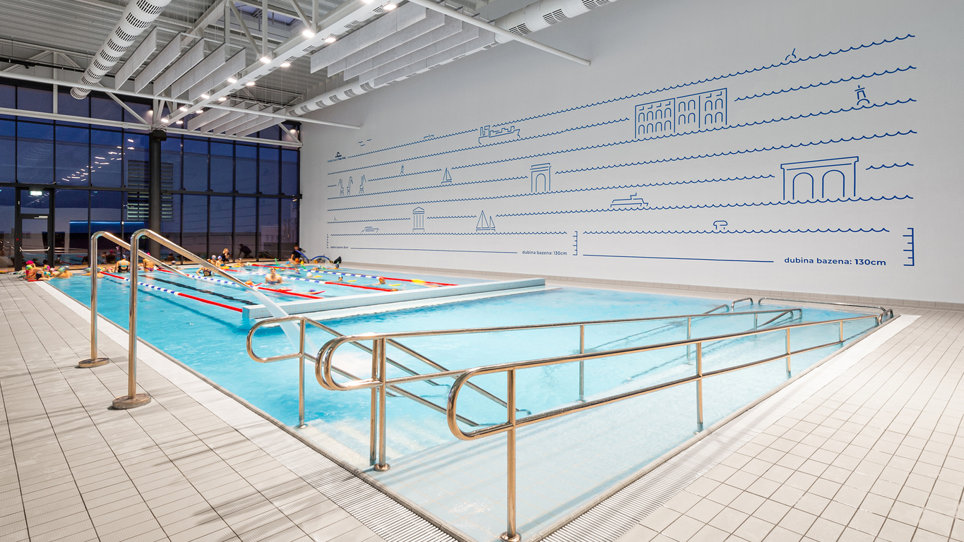 The outcome is a wayfinding system which "guides" the visitor similarly with how a line at the bottom of the pool guides a swimmer towards their goal.