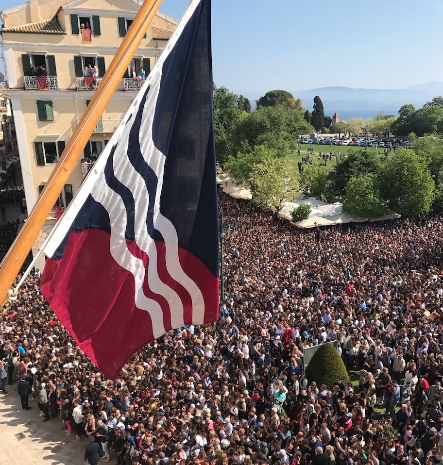 "The Diapontial flag field consists of the historical colours of Corfu, burgundy and navy blue, divided diagonally with navy blue on top and burgundy on the bottom. The colours are there to emphasize the geographical and cultural ties of the islands to Corfu. The diagonal division was chosen because it is both more unusual and much rarer than a vertical or horizontal division and because it has been a mainstay of various movements that emphasized their independent spirits"